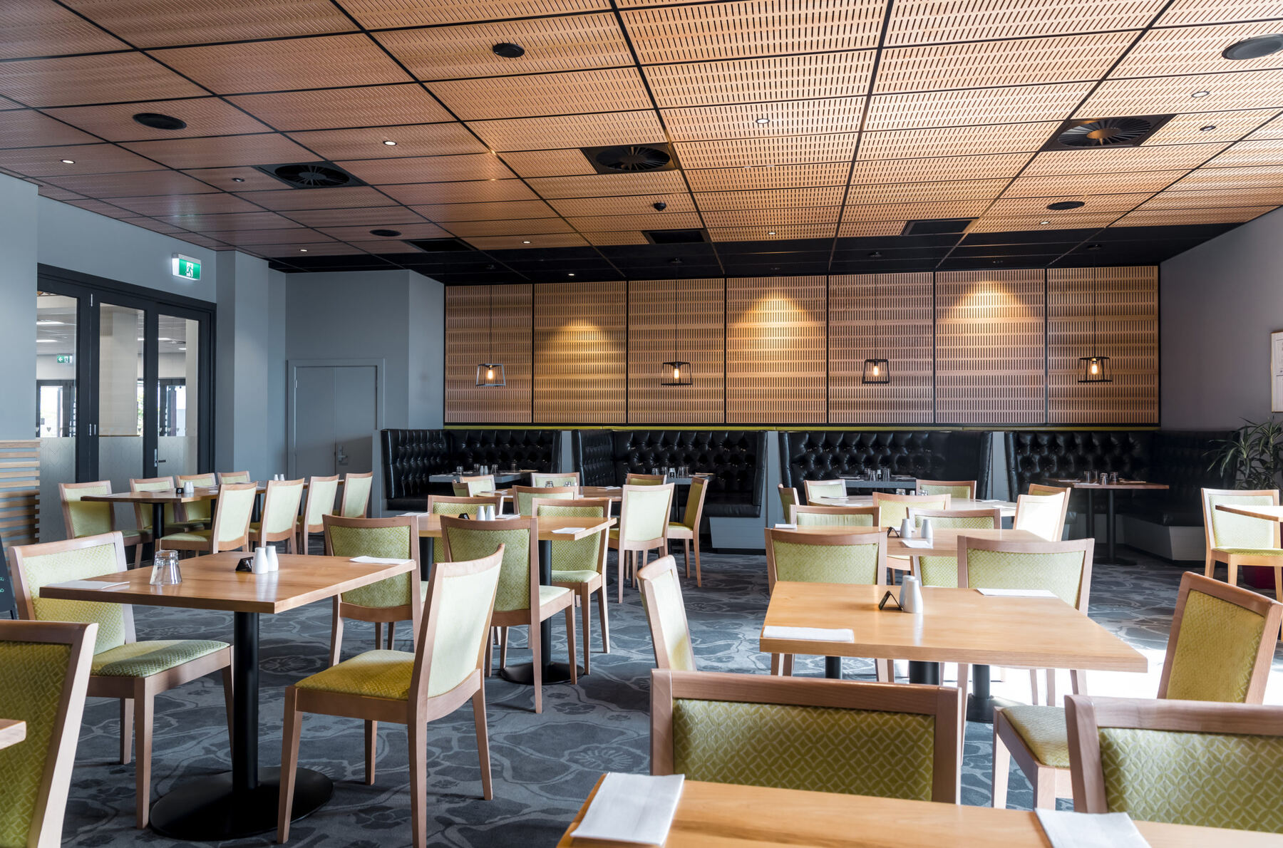 Dining room with booth seating at the Spitfire Restaurant