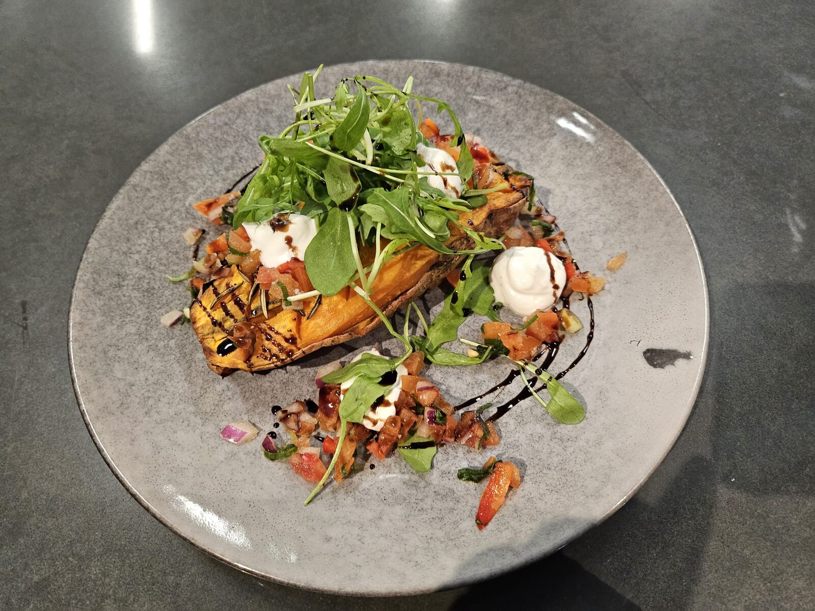 Loaded baked kumara - The Spitfire Restaurant